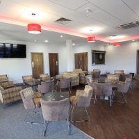 Chairs and tables in lounge area