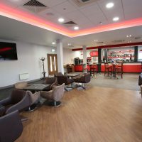 Tables and chairs in the cafe at Vauxhall Sports Motor Club